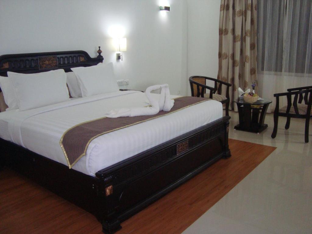 Fabhotel White Dammar Тривандрум Экстерьер фото